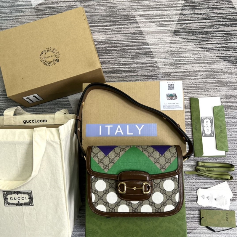 G*u*i top handle bags